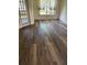 Living area features new flooring, window and door with access to the outside at 8895 Sw 57Th Ct Rd, Ocala, FL 34476