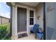 Inviting front porch features comfortable seating and decorative elements at 8951 Sw 58Th Street Rd, Ocala, FL 34481