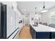 Stylish kitchen boasting a large island, white cabinetry, and modern finishes at 8951 Sw 58Th Street Rd, Ocala, FL 34481