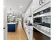 Open kitchen layout featuring island seating, modern appliances, and stylish finishes at 8951 Sw 58Th Street Rd, Ocala, FL 34481