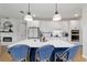 Spacious kitchen featuring a center island, modern fixtures, and ample counter space at 8951 Sw 58Th Street Rd, Ocala, FL 34481