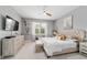 Bright main bedroom with ample natural light, stylish decor, and a peaceful atmosphere at 8951 Sw 58Th Street Rd, Ocala, FL 34481