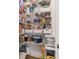 Organized pantry with wire shelving and various food items in bins and containers at 8951 Sw 58Th Street Rd, Ocala, FL 34481