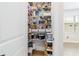 Organized pantry with ample shelving for storage at 8951 Sw 58Th Street Rd, Ocala, FL 34481