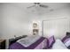 Bedroom featuring a ceiling fan, and neutral decor at 9074 Se 48Th Court Rd, Ocala, FL 34480