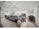 Spacious open-concept living room connecting to the kitchen and dining area, perfect for gatherings at 9074 Se 48Th Court Rd, Ocala, FL 34480