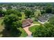 Aerial view of a stunning residence, showcasing its landscaped yard and neighboring homes at 10337 Sw 74Th Ter, Ocala, FL 34476