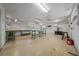 Spacious basement with ample lighting, and shelving at 10337 Sw 74Th Ter, Ocala, FL 34476