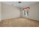 Bedroom showcasing a ceiling fan and window that provides natural light at 10337 Sw 74Th Ter, Ocala, FL 34476