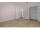 Bedroom with carpet flooring and closet with ample storage space at 10337 Sw 74Th Ter, Ocala, FL 34476