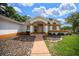 Inviting walkway leading to the front door of this well-maintained home at 10337 Sw 74Th Ter, Ocala, FL 34476