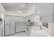 Well-appointed kitchen featuring white cabinets, modern appliances, and a functional design at 10337 Sw 74Th Ter, Ocala, FL 34476