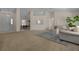 Open-concept living area showcases seamless flow with a neutral palette and comfortable seating at 10337 Sw 74Th Ter, Ocala, FL 34476