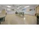 Bright workshop with multiple worktables, ceiling fans, and built-in shelves offers ample space at 10337 Sw 74Th Ter, Ocala, FL 34476