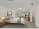 Spacious bedroom with neutral tones, ample natural light, and elegant contemporary furnishings at 11136 Se 69Th Ter, Belleview, FL 34420