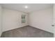 Cozy bedroom with neutral carpet and natural light at 11136 Se 69Th Ter, Belleview, FL 34420