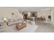 Open floor plan with kitchen, living room, and dining area at 11136 Se 69Th Ter, Belleview, FL 34420