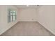 Empty carpeted room with window and neutral paint at 11136 Se 69Th Ter, Belleview, FL 34420