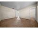 The spacious bedroom features soft carpeting, providing comfort and style, with a doorway to a closet at 1115 Silver Rd, Ocala, FL 34472