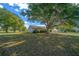 Spacious home with an expansive lawn and mature trees, offering a peaceful setting at 1115 Silver Rd, Ocala, FL 34472