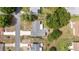 An aerial view of a home with a well-maintained roof and a spacious driveway at 11153 Sw 79Th Ave, Ocala, FL 34476