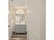 Updated bathroom with vanity, neutral paint, and sleek plank flooring at 11153 Sw 79Th Ave, Ocala, FL 34476