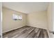 Bright bedroom with natural light, plank flooring, and a view from the window at 11153 Sw 79Th Ave, Ocala, FL 34476