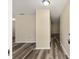 Open hallway featuring new floors and neutral paint, enhancing the home's modern appeal at 11153 Sw 79Th Ave, Ocala, FL 34476