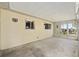 Relaxing sunroom with a light fixture, providing a tranquil space with natural light at 11153 Sw 79Th Ave, Ocala, FL 34476