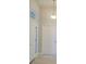 Bright entryway featuring high ceilings, tile floors, and double doors at 13154 Sw 69Th Ct, Ocala, FL 34473