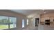 Bright, open kitchen and dining area features stainless appliances and views of the backyard at 13154 Sw 69Th Ct, Ocala, FL 34473