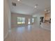 Spacious living area with views of backyard, and open access to kitchen at 13154 Sw 69Th Ct, Ocala, FL 34473