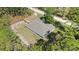 Aerial view of a single-Gathering home with a large backyard and wooden perimeter fence at 13164 Sw 78Th Place, Dunnellon, FL 34432