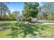 Charming single-story home with stone accents, a two-car garage, and a fenced perimeter at 13164 Sw 78Th Place, Dunnellon, FL 34432