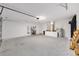 Spacious garage with ample room for storage and projects with an access door to the house at 13164 Sw 78Th Place, Dunnellon, FL 34432