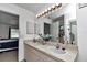 Spacious bathroom featuring a double sink vanity and ample lighting at 13800 Sw 33Rd Court Rd, Ocala, FL 34473