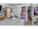 Bedroom featuring decor, a vanity, storage, and warm lighting at 13800 Sw 33Rd Court Rd, Ocala, FL 34473