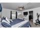 Bedroom with a window offering views, a dresser, and a TV at 13800 Sw 33Rd Court Rd, Ocala, FL 34473