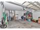 Spacious garage used for storage, featuring a clean floor and good lighting at 13800 Sw 33Rd Court Rd, Ocala, FL 34473