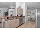 Efficient kitchen featuring stainless steel appliances and a cozy breakfast nook at 13800 Sw 33Rd Court Rd, Ocala, FL 34473