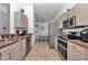 Functional kitchen with stainless steel appliances and cozy breakfast area at 13800 Sw 33Rd Court Rd, Ocala, FL 34473