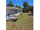 Generous backyard providing ample space for various activities and relaxation, awaiting personal touches and landscaping at 1441 Admiral Nimitz Ave, Daytona Beach, FL 32124