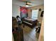 Bedroom featuring ceiling fan, natural light, and wood-look floors at 1441 Admiral Nimitz Ave, Daytona Beach, FL 32124