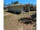 Inviting single-story home featuring a classic design, a well-maintained yard, and serene neighborhood surroundings at 1441 Admiral Nimitz Ave, Daytona Beach, FL 32124