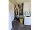 Utility room with standard washer, water heater and storage, providing practical space for household chores at 1441 Admiral Nimitz Ave, Daytona Beach, FL 32124