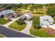 An aerial view of the property showcasing its landscaping and proximity to the golf course at 15426 Sw 14Th Avenue Rd, Ocala, FL 34473