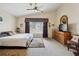 Bright main bedroom with vaulted ceiling and comfortable natural lighting at 15426 Sw 14Th Avenue Rd, Ocala, FL 34473