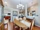 Open-concept dining area with a view of the adjacent kitchen and living spaces at 17901 Sw 25Th Avenue Rd, Ocala, FL 34473