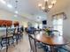 Open floor plan seamlessly integrates the kitchen, dining, and living areas at 17901 Sw 25Th Avenue Rd, Ocala, FL 34473