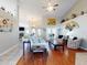 Open living space with a blend of tile and wood flooring at 17901 Sw 25Th Avenue Rd, Ocala, FL 34473